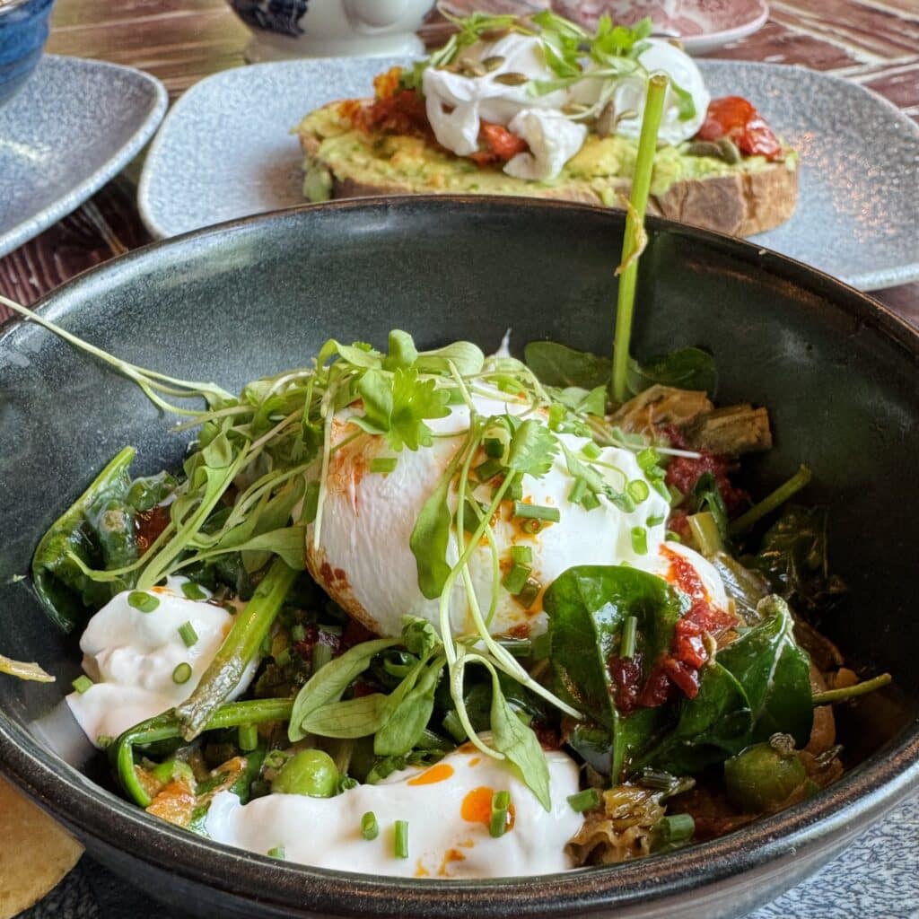 The Lost & Found Knutsford Green Shakshuka Eggs poached to perfection on the green shakshuka